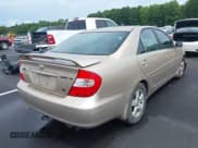 ✅ 2002 Toyota Camry XLE • VIN: 4T1BF30K92U015971 • Lot: 42988086. Listed on IAAI with 284,511 mi. Free auction sales archive from the USA and detailed vehicle history report at DreamBid. Image 4.