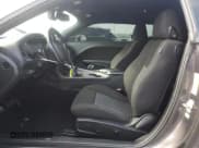 ✅ 2021 Dodge Challenger SXT • VIN: 2C3CDZAG6MH599882 • Lot: 49601674. Wystawiony na Copart z przebiegiem 61 214 mil. Bezpłatny archiwum sprzedaży aukcyjnych z USA i szczegółowy raport historii pojazdu na DreamBid. Zdjęcie 7.