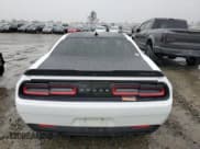 ✅ 2018 Dodge Challenger T/A • VIN: 2C3CDZBT9JH165950 • Lot: 44625933. Wystawiony na Copart z przebiegiem 76 806 mil. Bezpłatny archiwum sprzedaży aukcyjnych z USA i szczegółowy raport historii pojazdu na DreamBid. Zdjęcie 6.