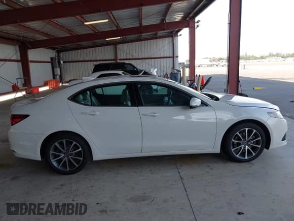 ✅ 2015 Acura TLX Technology • VIN: 19UUB2F57FA011589 • Lot: 43323374. Listed on IAAI with 118,152 mi. Free auction sales archive from the USA and detailed vehicle history report at DreamBid. Image 13.