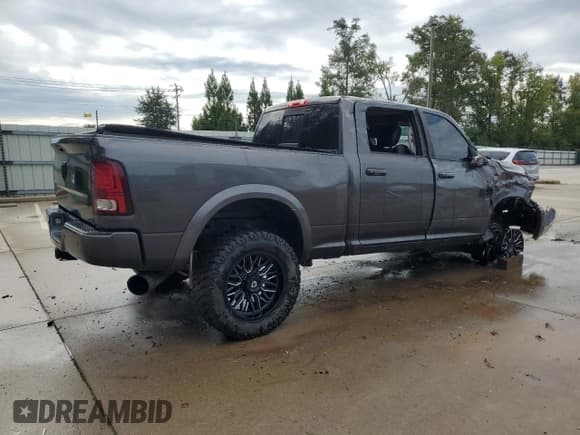 ✅ 2017 Ram 2500 Laramie • VIN: 3C6UR5FLXHG763129 • Lot: 85890955. Listed on Copart with 130,666 mi. Free auction sales archive from the USA and detailed vehicle history report at DreamBid. Image 3.
