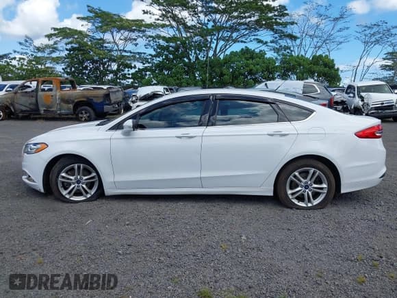 ✅ 2018 Ford Fusion SE • VIN: 3FA6P0H74JR273280 • Лот: 43291660. Опубликован ранее на IAAI с пробегом 53 809 миль. Бесплатный доступ к архиву аукционных продаж из США и подробный отчёт об истории автомобиля на DreamBid. Изображение 14.