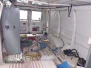 ✅ 1991 Ford Econoline Cargo • VIN: 1FTES14N5MHA51447 • Lot: 43497014. Wystawiony na IAAI z przebiegiem 18 049 mil. Bezpłatny archiwum sprzedaży aukcyjnych z USA i szczegółowy raport historii pojazdu na DreamBid. Zdjęcie 8.