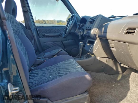 ✅ 2000 Toyota RAV4 • VIN: JT3HP10V2Y0233457 • Лот: 94384195. Опубликован ранее на Copart с пробегом 238 552 миль. Бесплатный доступ к архиву аукционных продаж из США и подробный отчёт об истории автомобиля на DreamBid. Изображение 7.