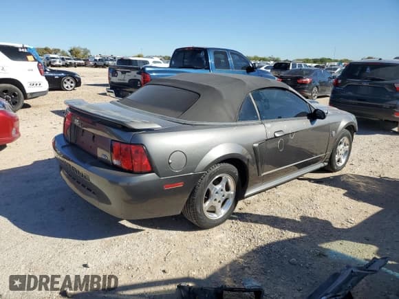 ✅ 2004 Ford Mustang Deluxe • VIN: 1FAFP44404F117628 • Lot: 81377524. Listed on Copart with 39,697 mi. Free auction sales archive from the USA and detailed vehicle history report at DreamBid. Image 3.