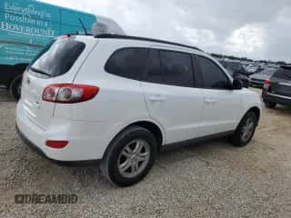 2012 Hyundai Santa Fe GLS z VIN 5XYZG3ABXCG113666, wystawiony jako Copart lot #74131604 z przebiegiem 121 303 mil mil oraz Szkoda całkowita • Salvage title. Historia ofert i sprzedaży dostępna na DreamBid. Obrazek 3.