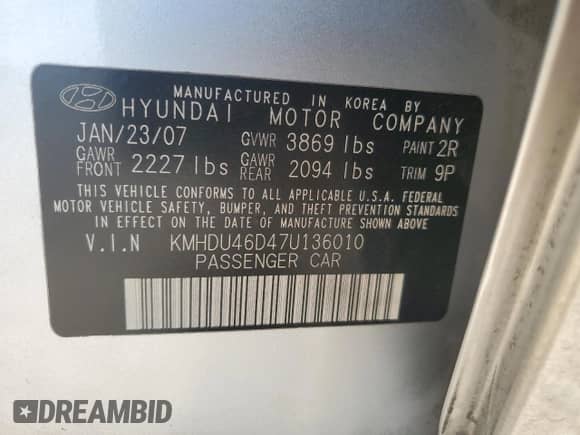 2007 Hyundai Elantra GLS z VIN KMHDU46D47U136010, wystawiony jako Copart lot #75507334 z przebiegiem 195 870 mil mil oraz Szkoda całkowita • Salvage title. Historia ofert i sprzedaży dostępna na DreamBid. Obrazek 14.
