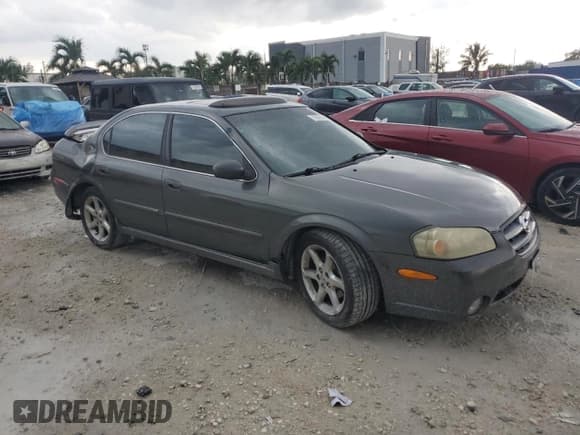 ✅ 2003 Nissan Maxima GLE • VIN: JN1DA31A03T439390 • Лот: 70008165. Опубликован ранее на Copart с пробегом 194 894 миль. Бесплатный доступ к архиву аукционных продаж из США и подробный отчёт об истории автомобиля на DreamBid. Изображение 4.