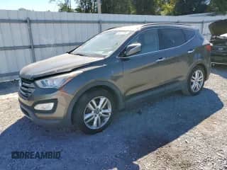 2013 Hyundai Santa Fe Sport z VIN 5XYZU3LA5DG124041, wystawiony jako Copart lot #86317095 z przebiegiem 155 372 mil mil oraz Czysty tytuł • Clean title. Historia ofert i sprzedaży dostępna na DreamBid. Obrazek 1.