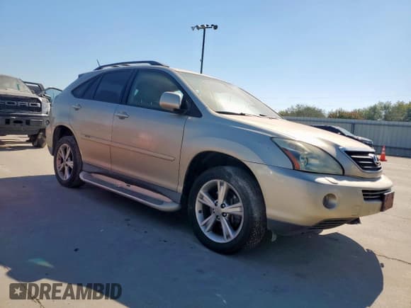 ✅ 2007 Lexus RX 400h • VIN: JTJHW31U272034408 • Lot: 85512025. Wystawiony na Copart z przebiegiem 192 990 mil. Bezpłatny archiwum sprzedaży aukcyjnych z USA i szczegółowy raport historii pojazdu na DreamBid. Zdjęcie 4.