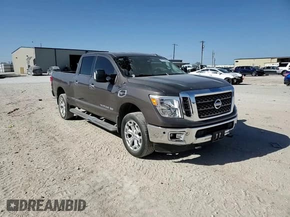 ✅ 2017 Nissan Titan SV • VIN: 1N6AA1F28HN551630 • Лот: 87104504. Опубликован ранее на Copart с пробегом 136 518 миль. Бесплатный доступ к архиву аукционных продаж из США и подробный отчёт об истории автомобиля на DreamBid. Изображение 10.