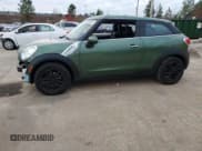 ✅ 2015 MINI Paceman • VIN: WMWSS1C56FWN95231 • Lot: 84958124. Listed on Copart with 65,099 mi. Free auction sales archive from the USA and detailed vehicle history report at DreamBid. Image 1.