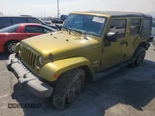 ✅ 2007 Jeep Wrangler Unlimited Sahara • VIN: 1J4GB591X7L165431 • Лот: 67629515. Опубликован ранее на Copart с пробегом 205 882 миль. Бесплатный доступ к архиву аукционных продаж из США и подробный отчёт об истории автомобиля на DreamBid. Изображение 1.