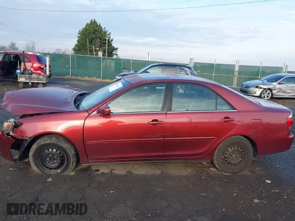 ✅ 2005 Toyota Camry LE • VIN: 4T1BE30K25U002518 • Lot: 43767923. Listed on IAAI with 215,358 mi. Free auction sales archive from the USA and detailed vehicle history report at DreamBid. Image 15.