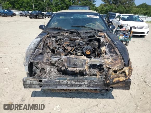 ✅ 1999 Ford Mustang • VIN: 1FAFP4446XF140819 • Lot: 65761395. Listed on Copart with Not provided. Free auction sales archive from the USA and detailed vehicle history report at DreamBid. Image 5.