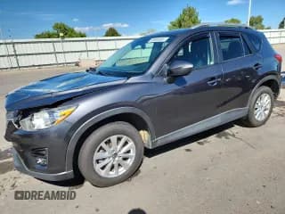 ✅ 2016 Mazda CX-5 Touring • VIN: JM3KE4CY6G0662637 • Lot: 80868985. Wystawiony na Copart z przebiegiem 83 661 mil. Bezpłatny archiwum sprzedaży aukcyjnych z USA i szczegółowy raport historii pojazdu na DreamBid. Zdjęcie 1.