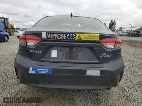 ✅ 2023 Toyota Corolla Hybrid LE • VIN: JTDBDMHE9P3000799 • Лот: 64416265. Опубликован ранее на Copart с пробегом 29 141 миль. Бесплатный доступ к архиву аукционных продаж из США и подробный отчёт об истории автомобиля на DreamBid. Изображение 6.