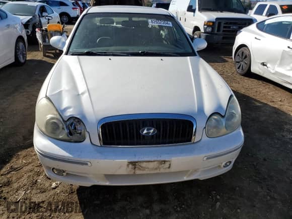 2004 Hyundai Sonata GLS z VIN KMHWF35HX4A975027, wystawiony jako Copart lot #82652354 z przebiegiem 148 296 mil mil oraz Szkoda całkowita • Salvage title. Historia ofert i sprzedaży dostępna na DreamBid. Obrazek 5.