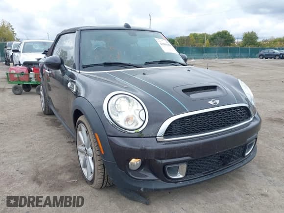 ✅ 2014 MINI Convertible S • VIN: WMWZP3C52ET707048 • Lot: 43436258. Listed on IAAI with 96,644 mi. Free auction sales archive from the USA and detailed vehicle history report at DreamBid. Image 1.