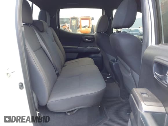 ✅ 2018 Toyota Tacoma SR5 • VIN: 3TMDZ5BN5JM048038 • Lot: 42084922. Listed on IAAI with 79,718 mi. Free auction sales archive from the USA and detailed vehicle history report at DreamBid. Image 8.