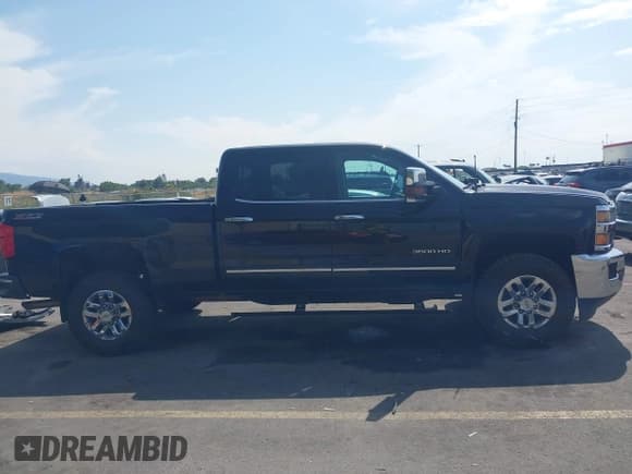 ✅ 2015 Chevrolet Silverado 3500HD • VIN: 1GC1K0EG5FF512945 • Lot: 43138447. Listed on IAAI with 91,028 mi. Free auction sales archive from the USA and detailed vehicle history report at DreamBid. Image 13.