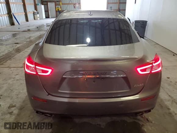 ✅ 2015 Maserati Ghibli • VIN: ZAM57XSA8F1155250 • Lot: 85365165. Wystawiony na Copart z przebiegiem 105 477 mil. Bezpłatny archiwum sprzedaży aukcyjnych z USA i szczegółowy raport historii pojazdu na DreamBid. Zdjęcie 6.