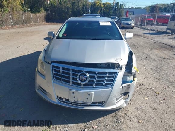 ✅ 2013 Cadillac XTS Luxury • VIN: 2G61P5S3XD9220569 • Lot: 43407862. Listed on IAAI with 121,728 mi. Free auction sales archive from the USA and detailed vehicle history report at DreamBid. Image 12.