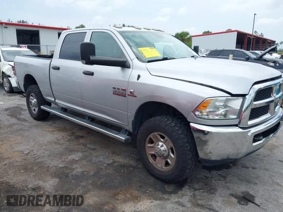 ✅ 2016 Ram 2500 Tradesman • VIN: 3C6UR5CL0GG357847 • Lot: 42403339. Listed on IAAI with 256,394 mi. Free auction sales archive from the USA and detailed vehicle history report at DreamBid. Image 1.