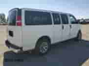 2014 Chevrolet Express Passenger 1LT with VIN 1GNSGCF43E1130315, listed as a Copart auction lot 69969665 with 148,721 mi miles and Salvage title. Bid and sale history available at DreamBid. Image 3.