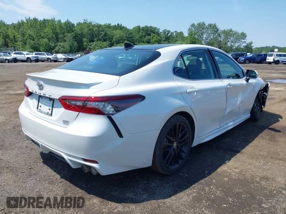 2022 Toyota Camry XSE with VIN 4T1K61BK4NU059883, listed as a IAAI auction lot 42661757 with 14,193 mi miles and . Bid and sale history available at DreamBid. Image 18.
