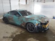 ✅ 2022 Ford Mustang Mach 1 • VIN: 1FA6P8R04N5554410 • Lot: 63574285. Listed on Copart with 13,302 mi. Free auction sales archive from the USA and detailed vehicle history report at DreamBid. Image 4.