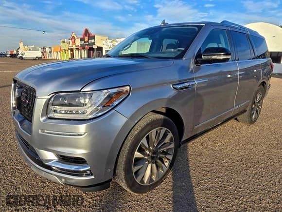 ✅ 2021 Lincoln Navigator Reserve • VIN: 5LMJJ2KT2MEL15047 • Лот: 96844425. Опубликован ранее на Copart с пробегом 113 066 миль. Бесплатный доступ к архиву аукционных продаж из США и подробный отчёт об истории автомобиля на DreamBid. Изображение 2.