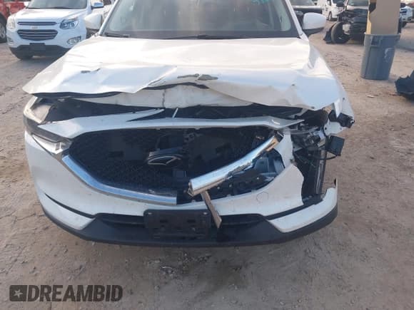 ✅ 2019 Mazda CX-5 Grand Touring • VIN: JM3KFBDM1K0650496 • Lot: 43483224. Listed on IAAI with 107,358 mi. Free auction sales archive from the USA and detailed vehicle history report at DreamBid. Image 6.