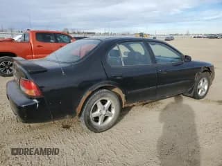 ✅ 1997 Nissan Maxima GXE • VIN: JN1CA21D3VT837132 • Lot: 78746874. Listed on Copart with 329,203 mi. Free auction sales archive from the USA and detailed vehicle history report at DreamBid. Image 3.