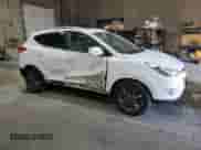 2014 Hyundai Tucson Limited with VIN KM8JUCAG2EU806309, listed as a Copart auction lot 66015735 with 104,328 mi miles and Salvage title. Bid and sale history available at DreamBid. Image 4.