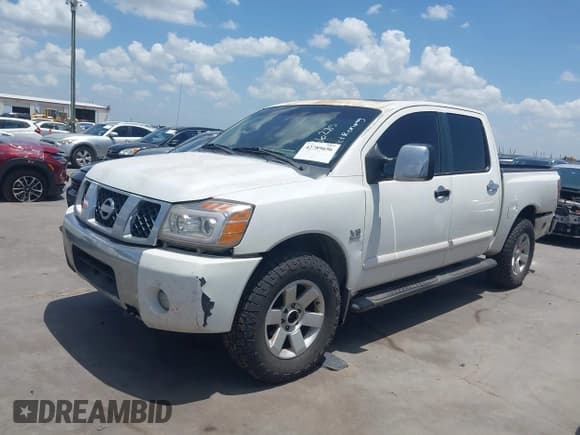 ✅ 2004 Nissan Titan LE • VIN: 1N6AA07B44N536285 • Lot: 42789656. Wystawiony na IAAI z przebiegiem 233 544 mil. Bezpłatny archiwum sprzedaży aukcyjnych z USA i szczegółowy raport historii pojazdu na DreamBid. Zdjęcie 2.