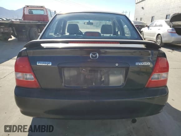 ✅ 2000 Mazda Protege DX • VIN: JM1BJ2220Y0239835 • Lot: 80228864. Wystawiony na Copart z przebiegiem 200 936 mil. Bezpłatny archiwum sprzedaży aukcyjnych z USA i szczegółowy raport historii pojazdu na DreamBid. Zdjęcie 6.