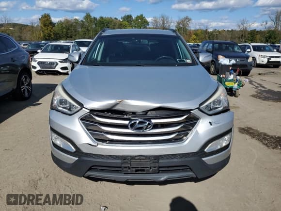 ✅ 2015 Hyundai Santa Fe Limited • VIN: 5XYZUDLA5FG276264 • Lot: 74999784. Listed on Copart with 107,257 mi. Free auction sales archive from the USA and detailed vehicle history report at DreamBid. Image 5.