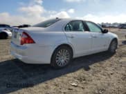 ✅ 2010 Ford Fusion Hybrid • VIN: 3FADP0L3XAR344428 • Lot: 92108485. Wystawiony na Copart z przebiegiem 175 446 mil. Bezpłatny archiwum sprzedaży aukcyjnych z USA i szczegółowy raport historii pojazdu na DreamBid. Zdjęcie 3.