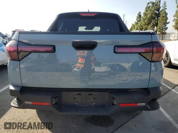 ✅ 2023 Hyundai Santa Cruz SEL • VIN: 5NTJB4AE2PH061557 • Lot: 82627805. Wystawiony na Copart z przebiegiem 38 721 mil. Bezpłatny archiwum sprzedaży aukcyjnych z USA i szczegółowy raport historii pojazdu na DreamBid. Zdjęcie 6.