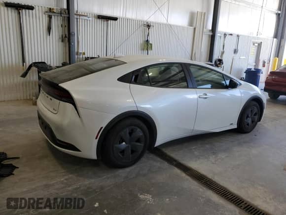 2024 Toyota Prius Limited with VIN JTDADABU9R3017082, listed as a Copart auction lot 85710085 with 9,983 mi miles and Salvage title. Bid and sale history available at DreamBid. Image 3.