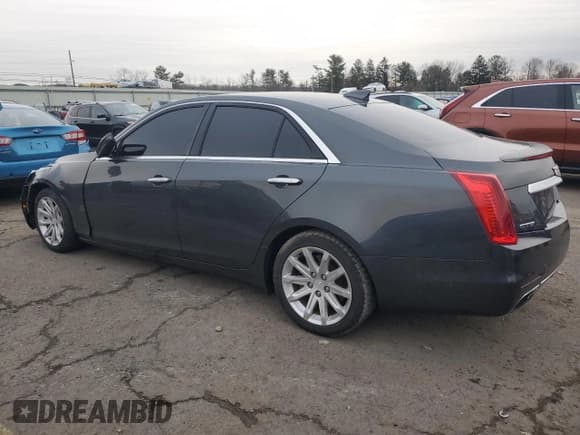 ✅ 2015 Cadillac CTS RWD • VIN: 1G6AP5SX1F0143400 • Lot: 85603234. Wystawiony na Copart z przebiegiem 94 613 mil. Bezpłatny archiwum sprzedaży aukcyjnych z USA i szczegółowy raport historii pojazdu na DreamBid. Zdjęcie 2.