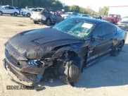 ✅ 2022 Ford Mustang GT Premium • VIN: 1FA6P8CF2N5113145 • Lot: 43376598. Listed on IAAI with 24,304 mi. Free auction sales archive from the USA and detailed vehicle history report at DreamBid. Image 2.