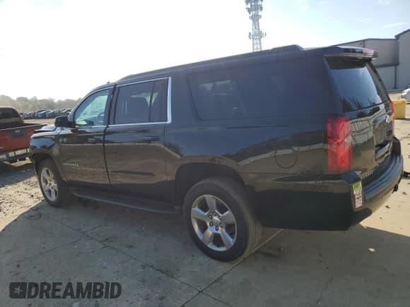 ✅ 2020 Chevrolet Suburban LS • VIN: 1GNSKGKC1LR279629 • Lot: 80777405. Listed on Copart with 95,401 mi. Free auction sales archive from the USA and detailed vehicle history report at DreamBid. Image 2.