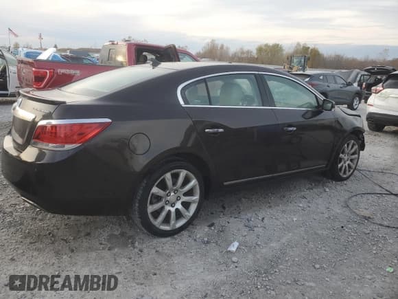 ✅ 2013 Buick LaCrosse Touring • VIN: 1G4GJ5E39DF178161 • Лот: 90990525. Опубликован ранее на Copart с пробегом 184 383 миль. Бесплатный доступ к архиву аукционных продаж из США и подробный отчёт об истории автомобиля на DreamBid. Изображение 3.