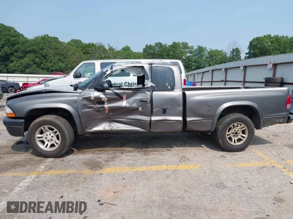 2002 Dodge Dakota Sport z VIN 1B7GL32X92S644072, wystawiony jako IAAI lot #42400800 z przebiegiem 232 611 mil mil oraz . Historia ofert i sprzedaży dostępna na DreamBid. Obrazek 14.