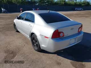 2012 Chevrolet Malibu 1LS with VIN 1G1ZB5E05CF240002, listed as a IAAI auction lot 43385460 with 151,059 mi miles and . Bid and sale history available at DreamBid. Image 3.