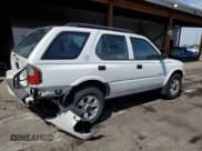 ✅ 2000 Isuzu Rodeo S • VIN: 4S2CK58W1Y4310227 • Лот: 56669865. Опубликован ранее на Copart с пробегом 57 543 миль. Бесплатный доступ к архиву аукционных продаж из США и подробный отчёт об истории автомобиля на DreamBid. Изображение 3.