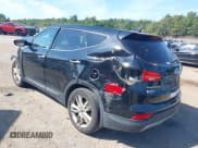 ✅ 2013 Hyundai Santa Fe Sport • VIN: 5XYZWDLA8DG064918 • Лот: 43188919. Опубликован ранее на IAAI с пробегом 97 899 миль. Бесплатный доступ к архиву аукционных продаж из США и подробный отчёт об истории автомобиля на DreamBid. Изображение 3.