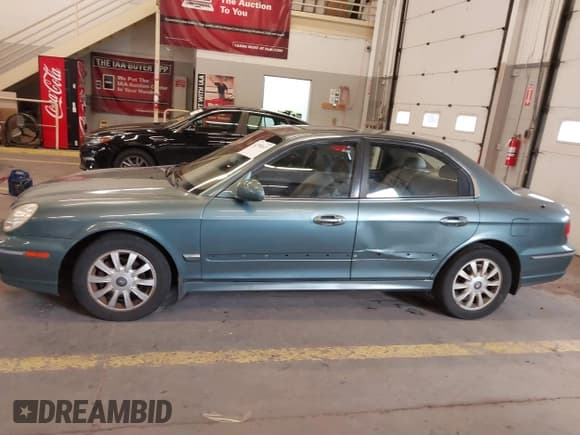 ✅ 2004 Hyundai Sonata GLS • VIN: KMHWF35HX4A004657 • Lot: 42334017. Listed on IAAI with 123,676 mi. Free auction sales archive from the USA and detailed vehicle history report at DreamBid. Image 14.
